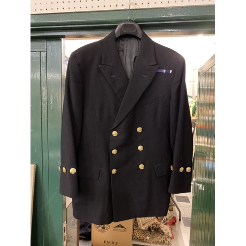 891 - A COLLECTION OF SECOND WORLD WAR AND LATER UNIFORM. A No1 Dress jacket with three buttons to the cuf... 