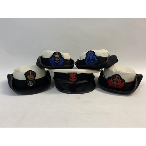 895 - A SELECTION OF ROYAL NAVY NURSING AND WREN CAPS. A Queen Alexander Royal Naval Nursing Officers hat,... 