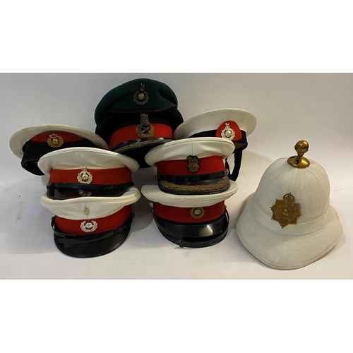 899 - A COLLECTION OF NINE ROYAL MARINES CAPS AND SIMILAR. Including four white peaked dress caps, various... 