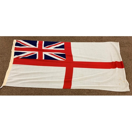 953 - TWO WHITE ENSIGN FLAGS AND ANOTHER. A white ensign, the border possibly dated 1987 with metal fixing... 