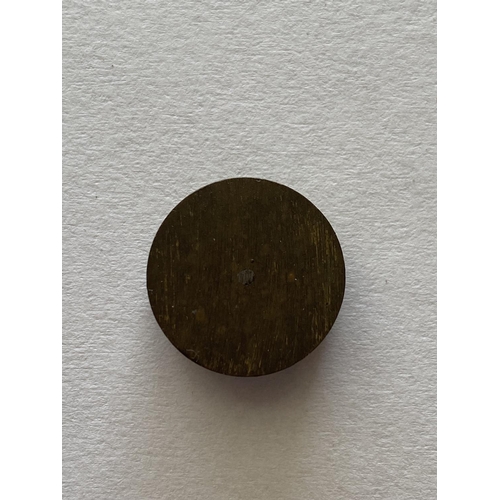 970 - A SECOND WORLD WAR BUTTON COMPASS. A small brass cased compass, possibly M19 SOE issue. 15mm wide.... 