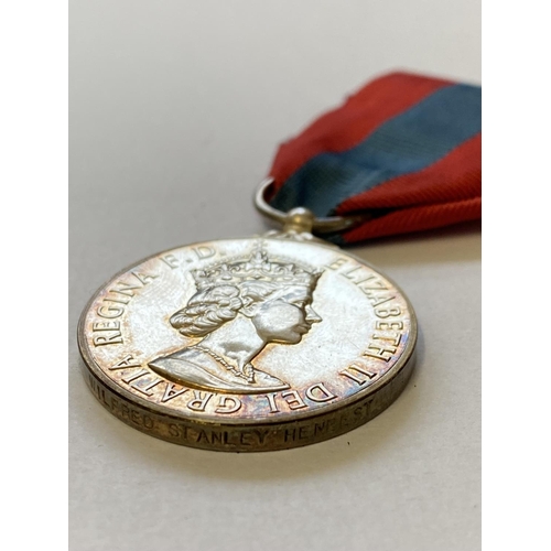 977 - AN IMPERIAL SERVICE MEDAL. A Queen Elizabeth II Imperial Service medal named to Wilfred Stanley Henb... 