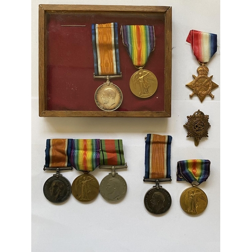 984 - A FIRST AND SECOND WORLD WAR GROUP OF THREE AND SIMILAR PAIRS TO THE ASC. Comprising a War medal and... 