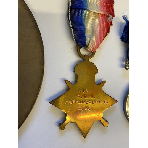 986 - A FIRST WORLD WAR TRIO AND MEMORIAL PLAQUE TO A CASUALTY AT JUTLAND. A trio comprising 1914-15 Star ... 