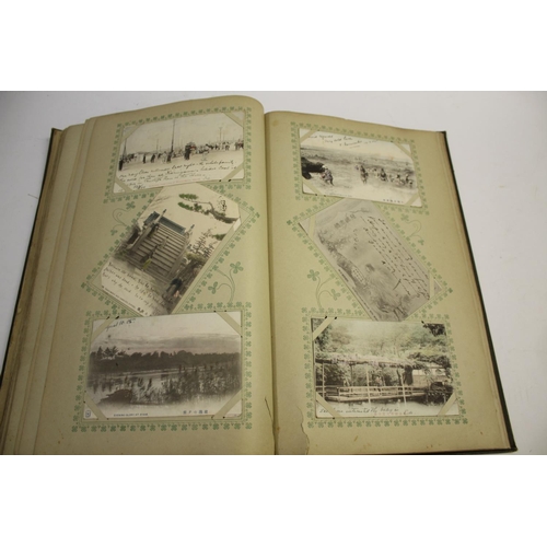 1300 - POSTCARD ALBUM - JAPAN a large fascinating album with a wide variety of Japanese postcards, many wit... 