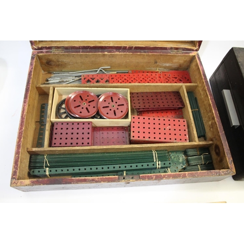 1378 - TWO BOXED SETS OF MECCANO including one wooden box with lift out tray and layer below, marked on the... 