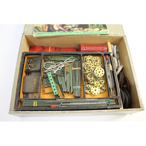 1384 - MECCANO including a box with a lift out tray and with various accessories, marked to the lid 1952 No... 