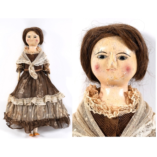 1425 - RARE 18THC ENGLISH WOODEN DOLL an English carved wooden doll with fixed eyes and stitched lashes, or... 