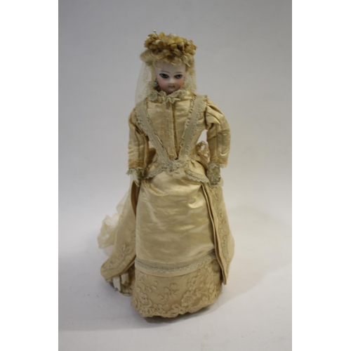 1428 - RARE JUMEAU PARISIENNE FASHION DOLL circa 1870, with a pale bisque swivel head on shoulder plate, an... 