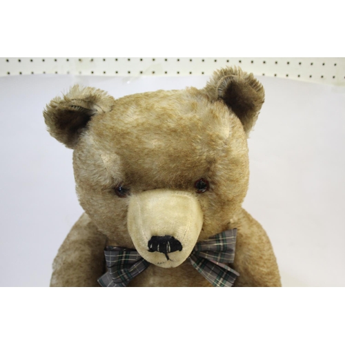 1430 - LARGE VINTAGE TEDDY BEAR of large size, circa 1950's and possibly by Hermann, with a swivel head and... 