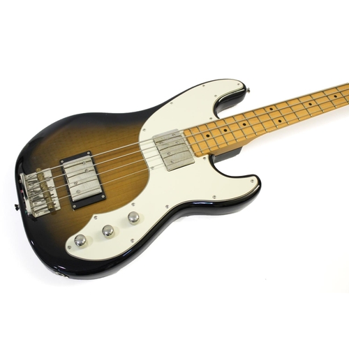 1440 - FENDER BASS GUITAR a Chinese made bass guitar with a two colour sunburst finish, maple neck and thre... 