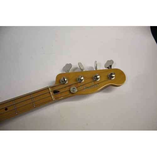 1440 - FENDER BASS GUITAR a Chinese made bass guitar with a two colour sunburst finish, maple neck and thre... 