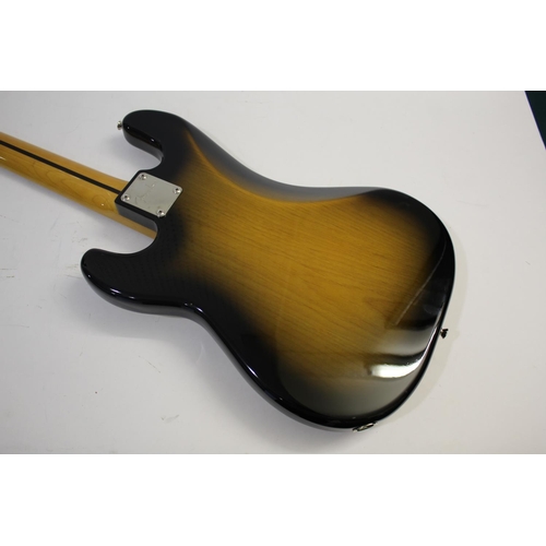 1440 - FENDER BASS GUITAR a Chinese made bass guitar with a two colour sunburst finish, maple neck and thre... 