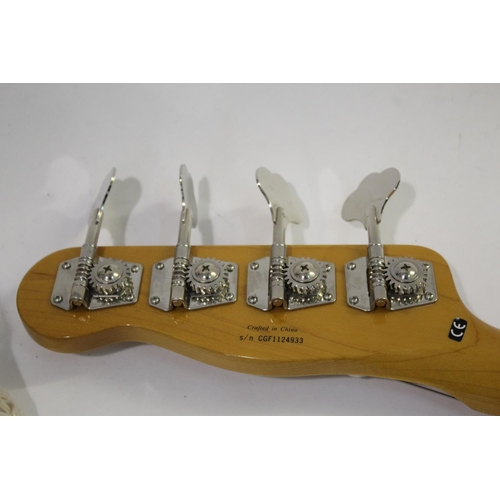 1440 - FENDER BASS GUITAR a Chinese made bass guitar with a two colour sunburst finish, maple neck and thre... 