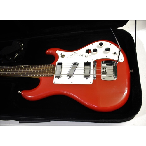 1448 - WATKINS RAPIER ELECTIC GUITAR a 1960's Watkins Rapier 33 electric guitar in a red and white finish, ... 