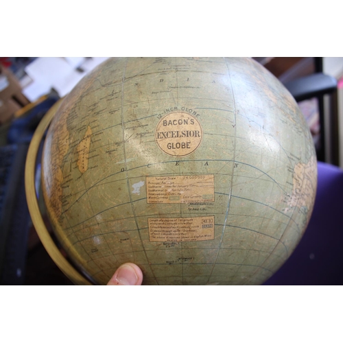 1452 - BACON'S EXCELSIOR TERRESTRIAL GLOBE a 12 inch terrestrial table globe mounted on a turned wooden sta... 