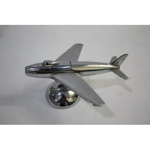 1465 - DUNHILL NOVELY TABLE LIGHTER - AEROPLANE a chrome lighter in the form of an aeroplane, 16cms long... 