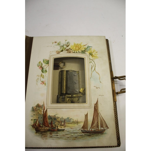 1481 - EARLY 20THC MUSICAL PHOTOGRAPH ALBUM, PHOTOGRAPHS & DRAWINGS a leather bound album with a working mu... 