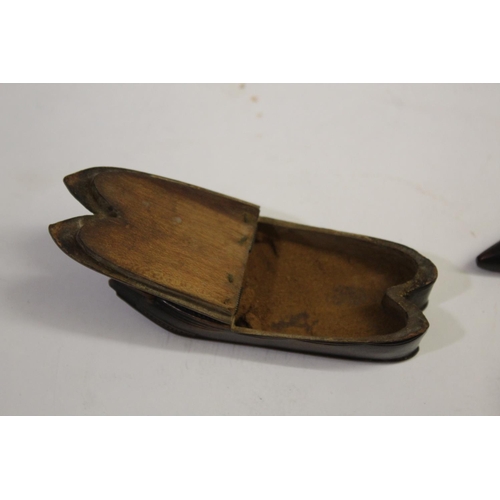 1490 - TREEN SNUFF BOXES including a carved snuff box in the form of two shoes's, with a hinged lid and bon... 