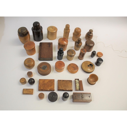 1491 - TREEN a mixed lot including a variety of lidded containers from the 19thc and 20thc, some with bottl... 