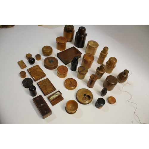 1491 - TREEN a mixed lot including a variety of lidded containers from the 19thc and 20thc, some with bottl... 