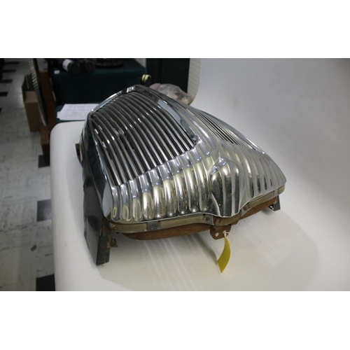 1496 - DAIMLER CAR RADIATOR GRILL a 1960's chrome and metal radiator grill, with green painted brackets to ... 