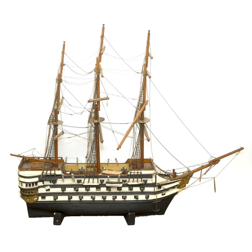 1508 - LARGE MODEL OF H.M.S VICTORY a late 19thc or early 20thc wooden model of HMS Victory, the model is s... 