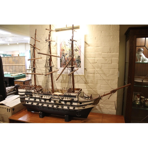 1508 - LARGE MODEL OF H.M.S VICTORY a late 19thc or early 20thc wooden model of HMS Victory, the model is s... 