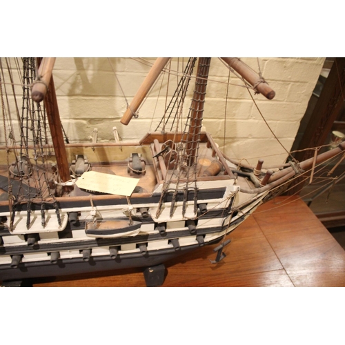 1508 - LARGE MODEL OF H.M.S VICTORY a late 19thc or early 20thc wooden model of HMS Victory, the model is s... 