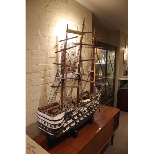 1508 - LARGE MODEL OF H.M.S VICTORY a late 19thc or early 20thc wooden model of HMS Victory, the model is s... 