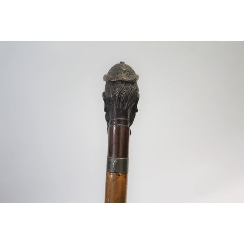 1510 - CARVED TOP WALKING STICK the top carved in the form of a gentleman with a long beard, with a metal c... 