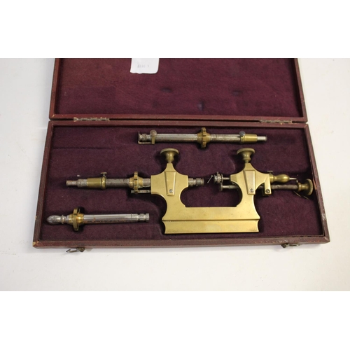 1518 - FRENCH WATCHMAKERS LATHE a brass and metal lathe in a fitted box with velvet lined interior, marked ... 