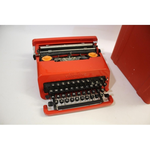 1525 - OLIVETTI 'VALENTINE' TYPEWRITER a red portable typewriter with carry case, designed by Ettore Sotsas... 