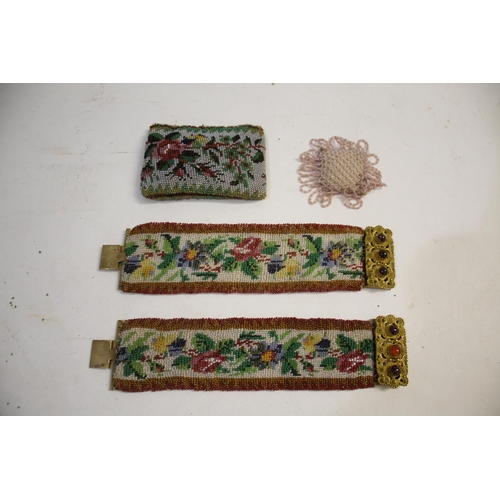 1583 - PAIR OF BEADWORK CUFFS a pair of matching 19thc beadwork cuffs with gilt metal clasps, also with two... 