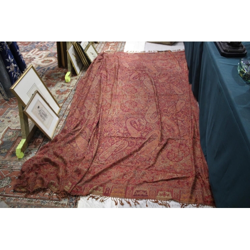 1612 - PAISLEY SHAWL a large paisley shawl with typical colours and motifs including boteh, with a fringe a... 