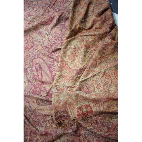 1612 - PAISLEY SHAWL a large paisley shawl with typical colours and motifs including boteh, with a fringe a... 