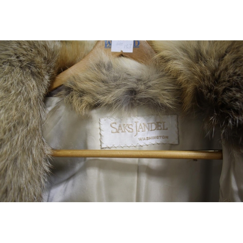 1618 - SAKS JANDEL (WASHINGTON) AMERICAN FUR COAT a full length fox fur coat with silk lined interior, UK s... 