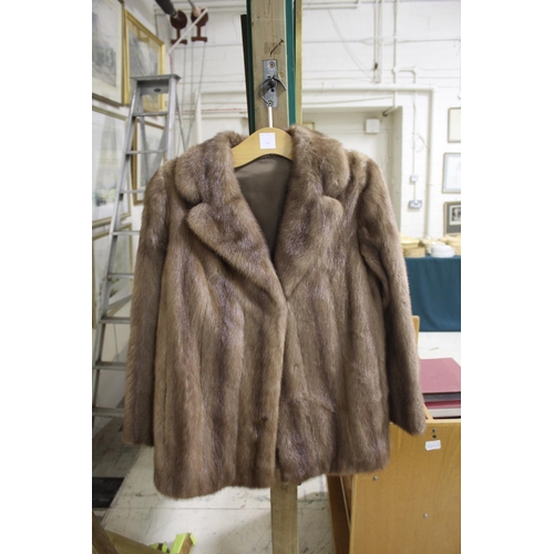 1646 - FUR COATS including an 1960's white mink coat (89cms high), a dark mink coat of a slightly earlier d... 