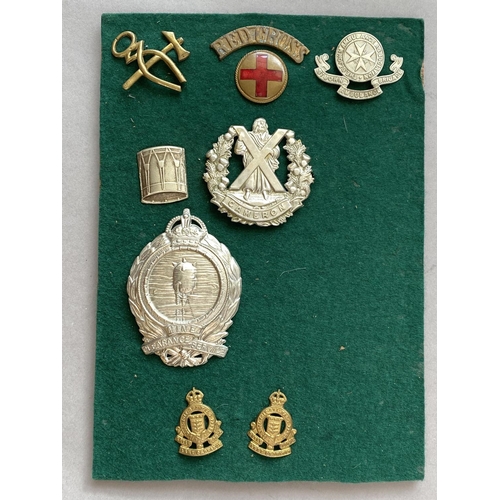 1094 - A COLLECTION OF CAP BADGES AND BUTTONS. A Mine Clearance Service badge, Cameron Highlanders badge, a... 