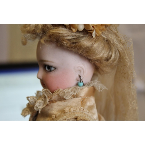 1428 - RARE JUMEAU PARISIENNE FASHION DOLL circa 1870, with a pale bisque swivel head on shoulder plate, an... 