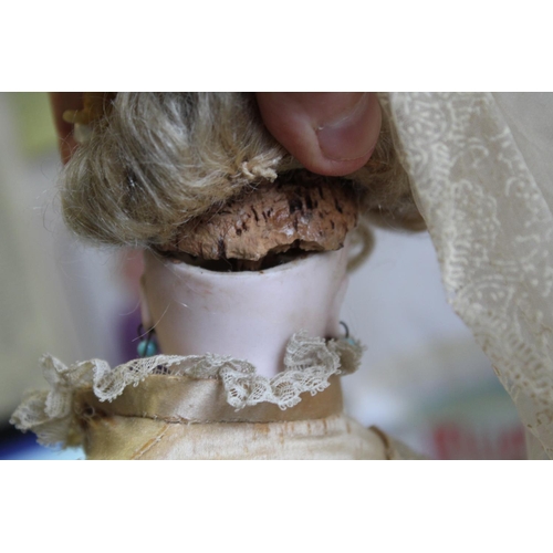 1428 - RARE JUMEAU PARISIENNE FASHION DOLL circa 1870, with a pale bisque swivel head on shoulder plate, an... 