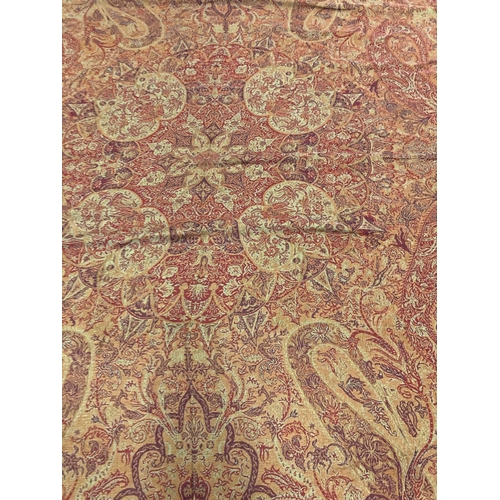 1612 - PAISLEY SHAWL a large paisley shawl with typical colours and motifs including boteh, with a fringe a... 