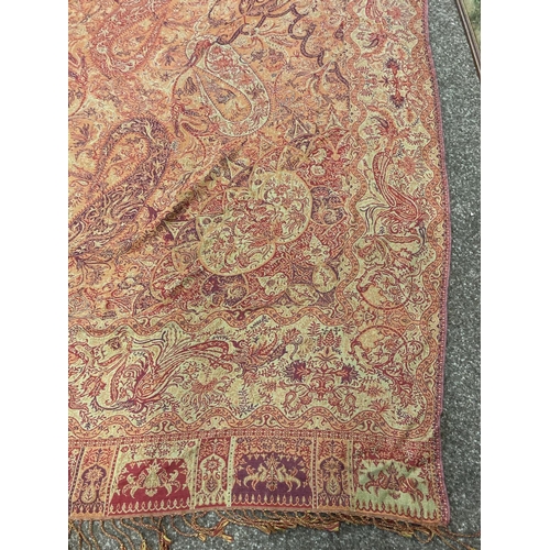 1612 - PAISLEY SHAWL a large paisley shawl with typical colours and motifs including boteh, with a fringe a... 