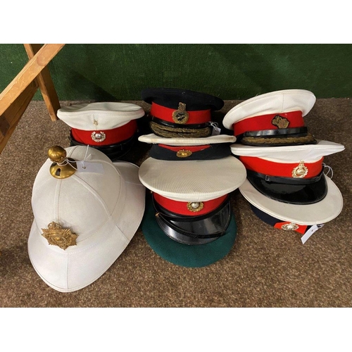 899 - A COLLECTION OF NINE ROYAL MARINES CAPS AND SIMILAR. Including four white peaked dress caps, various... 