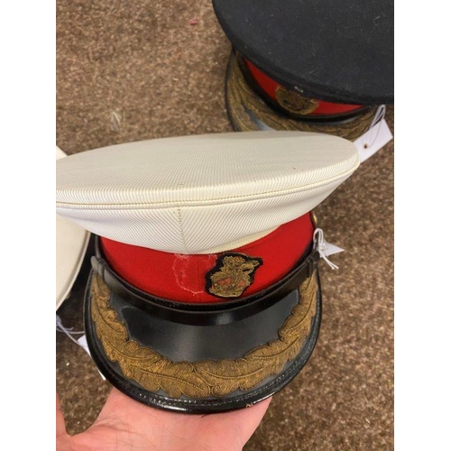 899 - A COLLECTION OF NINE ROYAL MARINES CAPS AND SIMILAR. Including four white peaked dress caps, various... 