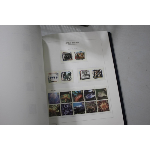 1309 - ROYAL MAIL MILLENNIUM COLLECTION STAMPS 3 albums of modern mint stamps, first day covers etc, also w... 