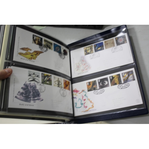 1309 - ROYAL MAIL MILLENNIUM COLLECTION STAMPS 3 albums of modern mint stamps, first day covers etc, also w... 