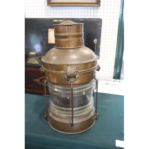 1483 - LARGE COPPER SHIPS LANTERN - THE MARITIME the copper lantern with a glass centre and metal handle, m... 