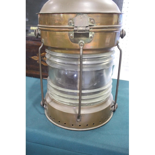 1483 - LARGE COPPER SHIPS LANTERN - THE MARITIME the copper lantern with a glass centre and metal handle, m... 