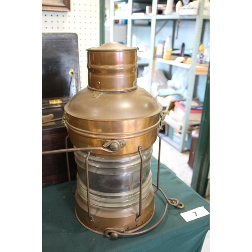 1483 - LARGE COPPER SHIPS LANTERN - THE MARITIME the copper lantern with a glass centre and metal handle, m... 